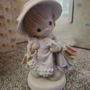 Charming Figurine with Hat and Dress